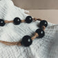 Glaskralen ketting aan touw