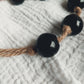 Glaskralen ketting aan touw