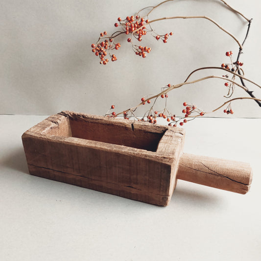 Houten bakje met handvat