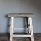 Oude houten kruk