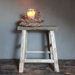 Oude houten kruk