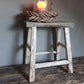 Oude houten kruk