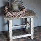 Oude houten kruk