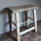 Oude houten kruk